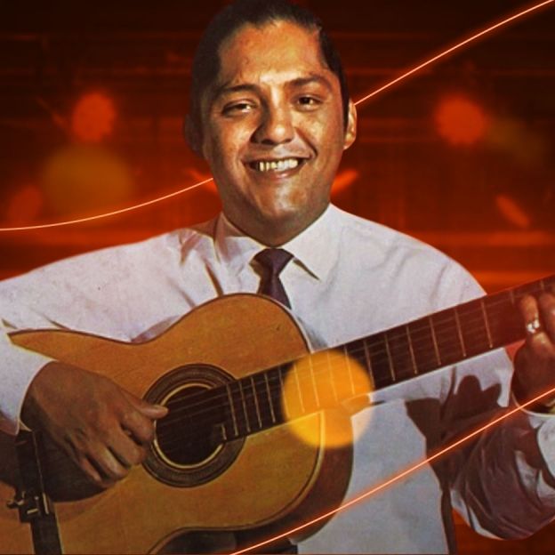 O músico Junior Jaramillo toca seu violão no centro da imagem