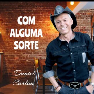 Foto da capa: Com Alguma Sorte - Daniel Carlini